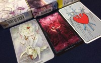 Comparing the Three of Swords from different decks